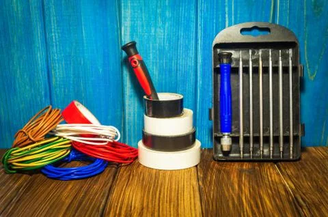 Tools and accessories used in electrical installations. Stock Photos