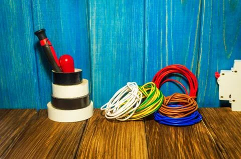 Tools and accessories used in electrical installations. Stock Photos