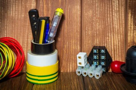 Tools and accessories used in electrical installations Stock Photos