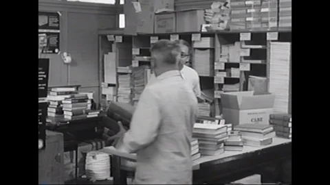 Tools and books with technical knowledge are passed out in care packages by the Stock Footage 101310892