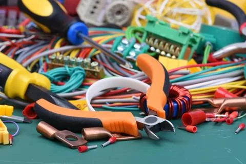 Tools and component used in electrical installations Stock Photos