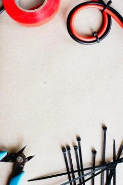 Tools and components for electrical wiring, electrical cable ties and nippers Stock Photos