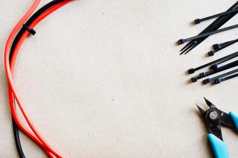 Tools and components for electrical wiring, electrical cable ties and nippers Stock Photos