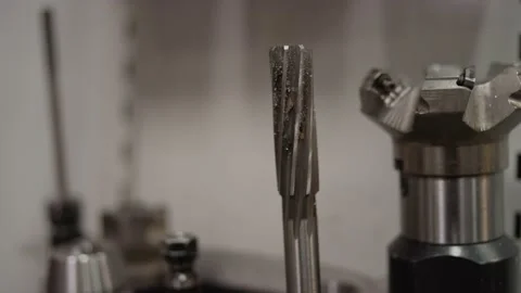 Tools and drill bits for creating molds in a mold machine in manufacturing plant Stock Footage 130668588