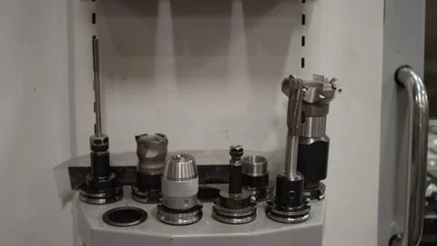 Tools and drill bits for creating molds in a mold machine in manufacturing plant Stock Footage 130668602