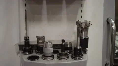Tools and drill bits for creating molds in a mold machine in manufacturing plant Stock Footage 146920941