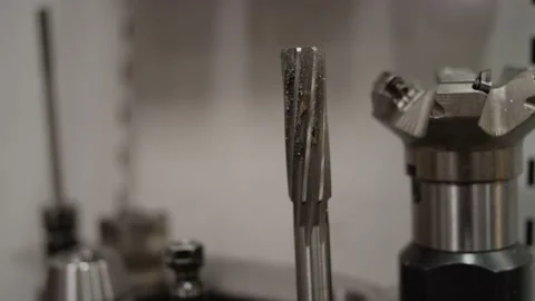 Tools and drill bits for creating molds in a mold machine in manufacturing plant Stock Footage 146921190