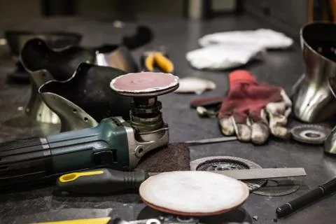 Tools and hardware on workshop table Stock Photos