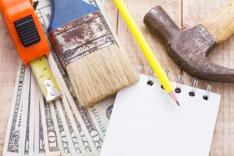 Tools and notebook to make a budget of remodeling or DIY at home Stock-Fotos