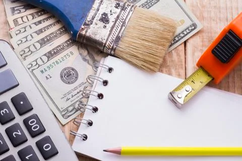 Tools and notebook to make a budget of remodeling or DIY at home Stock Photos