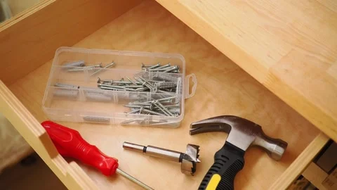 Tools and screws in a kitchen drawer Stock Footage 341227809