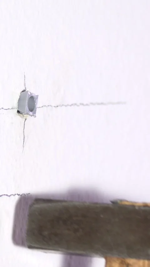 Tools and techniques for properly installing wall anchors at home Stock Footage 320752470