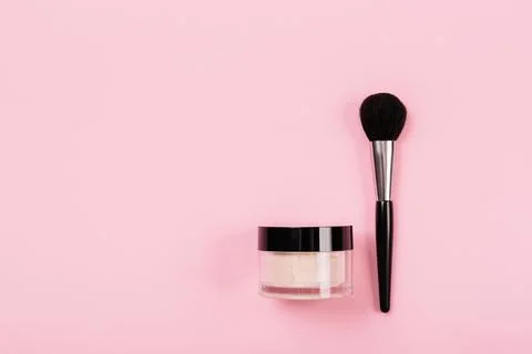 Tools for applying light refreshing makeup lie on a pink background . Brigh.. Stock Photos