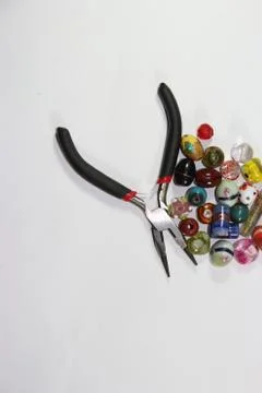 TOOLS ARMADO BIJOUTERI SCISSORS PEELS BOLITAS BEADS Stock Photos