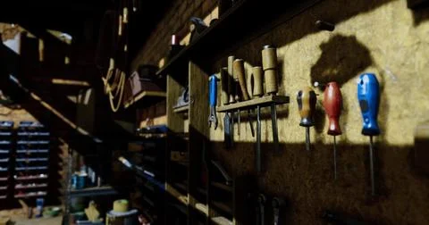 Tools arranged on a workshop wall with shadows in a rustic setting Stock Illustration