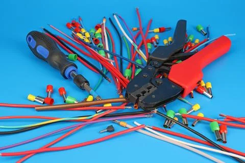 Tools for assembling an electrical switchboard in the workplace. Stock Photos