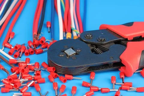 Tools for assembling an electrical switchboard in the workplace. Stock Photos