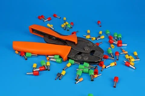 Tools for assembling an electrical switchboard in the workplace. Stock Photos