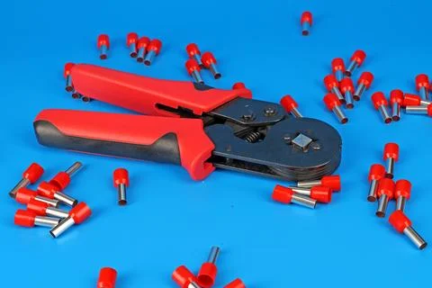 Tools for assembling an electrical switchboard in the workplace. Stock Photos