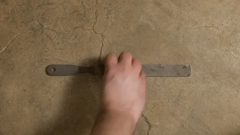 Tools being placed in frame on concrete Stock Footage 121011608