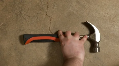 Tools being placed in frame on concrete Stock Footage 121012226