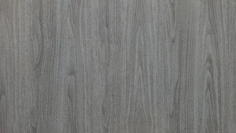 Tools being placed in frame by hand with grey wood texture backdrop Stock Footage 121002496