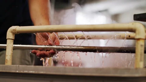 Tools being water cooled in an art studio Stock Footage 138406897