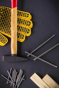 Tools for carpentry and accessories on a black background. Stock Photos