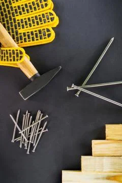 Tools for carpentry and accessories on a black background. Stock Photos