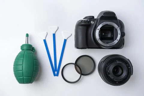 Tools for cleaning the sensor and lens of a DSLR camera Stock Photos