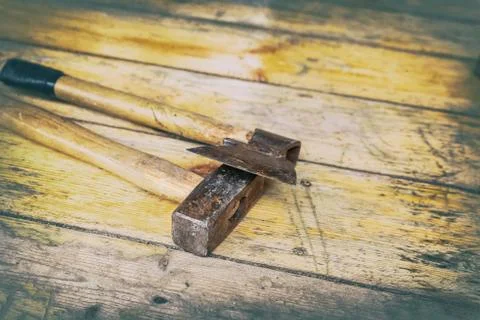 Tools construction big hammer ax metal head wooden handle background house Stock Photos