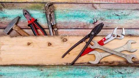 Tools for construction on a wooden background Foto stock