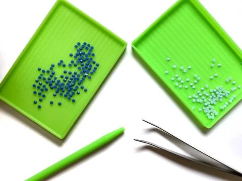 Tools for creating diamond embroidery isolated on white background. Needlewor Stock Photos