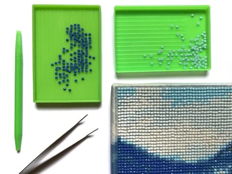 Tools for creating diamond embroidery isolated on white background Stock Photos