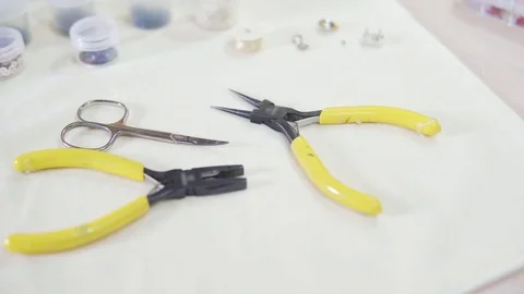 Tools for creating jewelry from beads Stock Footage 83521259