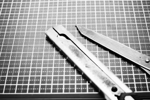 Tools on cutting mat black and white color tone style Stock Photos