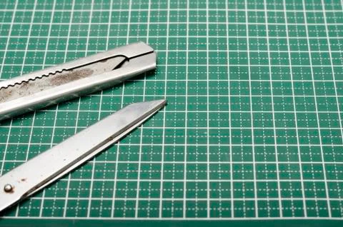 Tools on cutting mat Stock Photos