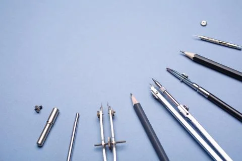 Tools for drawing on a blue background Stock Photos