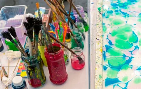 Tools for drawing on water in the technique of ebru. Stock Photos