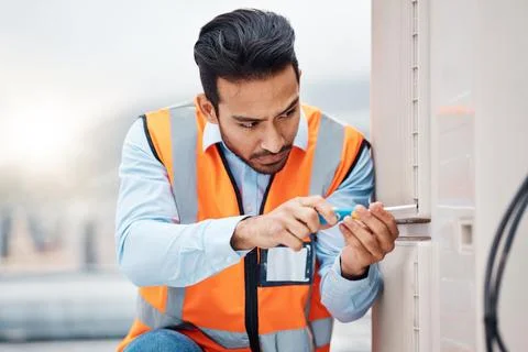 Tools, engineering and man with air conditioner for maintenance, repair and Stock Photos