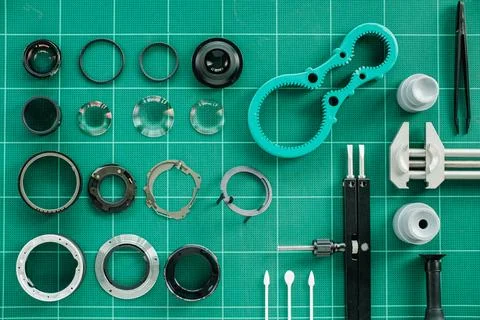 Tools for fixing and cleaning camera lens Stock Photos