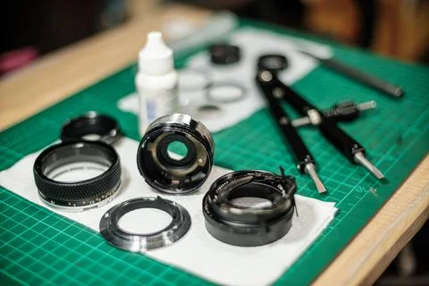 Tools for fixing and cleaning camera lens Stock Photos