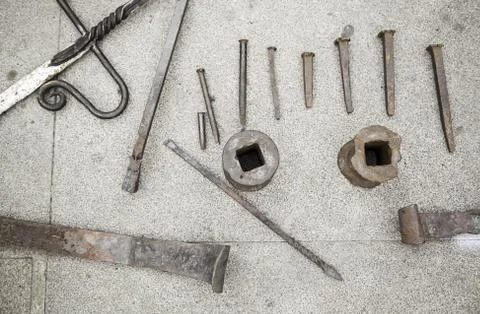 Tools of a forge, detail of an old tool, iron forge Stock Photos