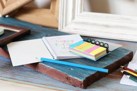 Tools, frame, notebook, congratulation on a wooden table, top view, father's day Stock Photos