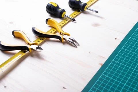 Tools on the green checked mat Stock Photos