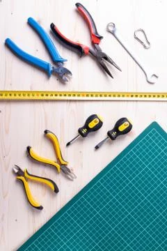 Tools on the green checked mat Stock Photos