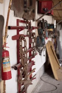 Tools hanging on the wall of the garage Stock Photos