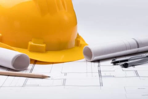 Tools With Hardhat On Blueprint Stockfoto's