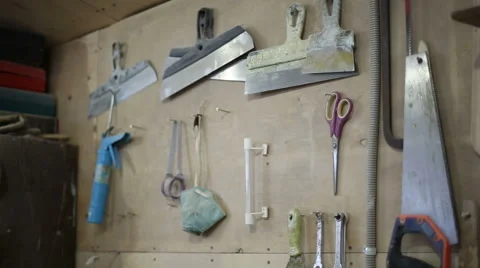 Tools hung on the wall in the carpentry workshop Stock Footage 59559864