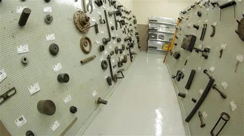 Tools, instruments and parts hanging on the wall Vídeo Stock 60918098